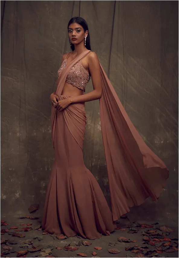 Dusty rose fishtail skirt saree with embellished sleeveless blouse